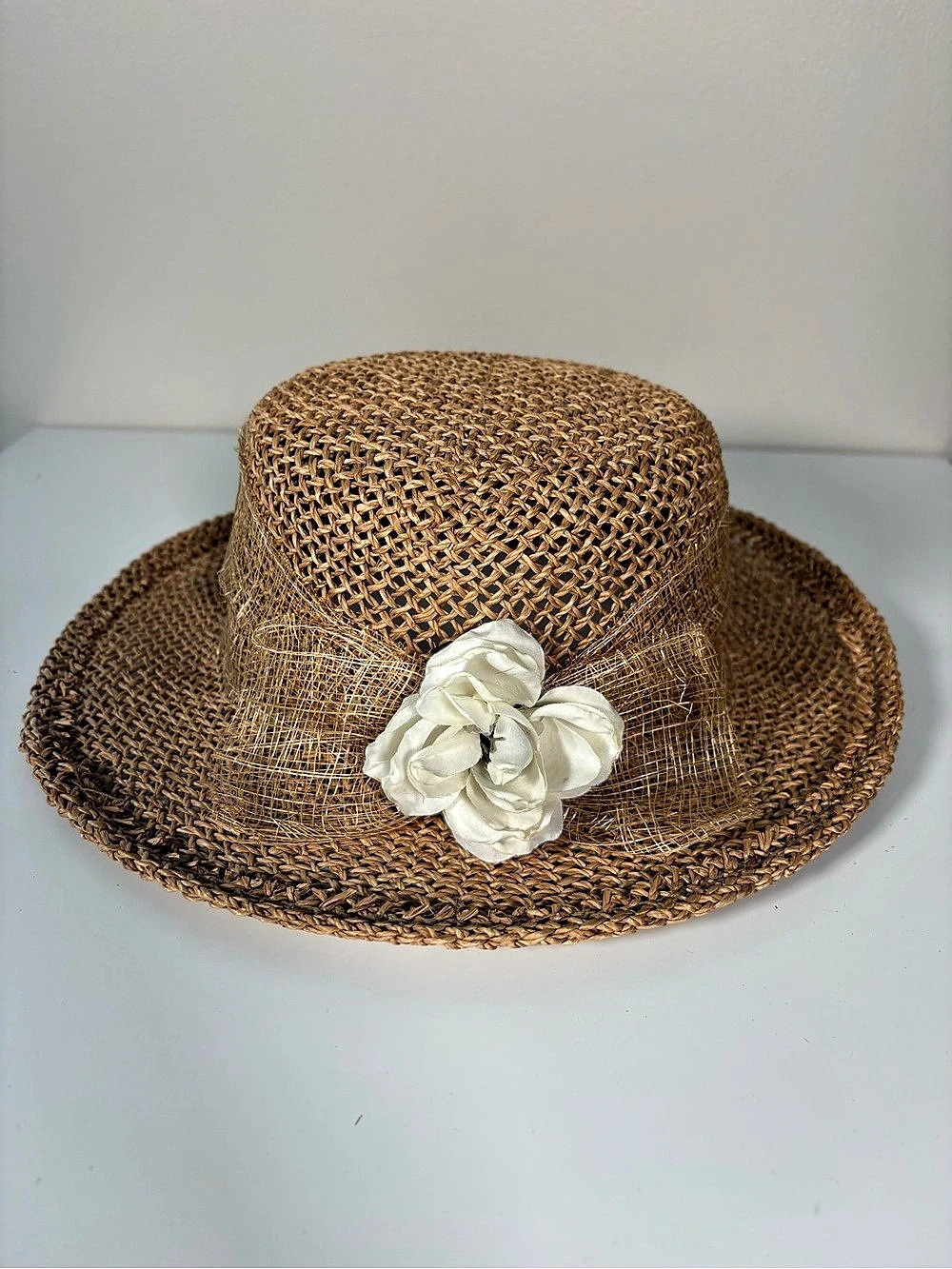 Woven Straw Hat with Flower in Brown